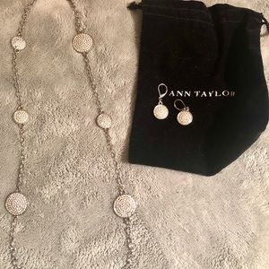 Worn a few times. Silver necklace and earrings